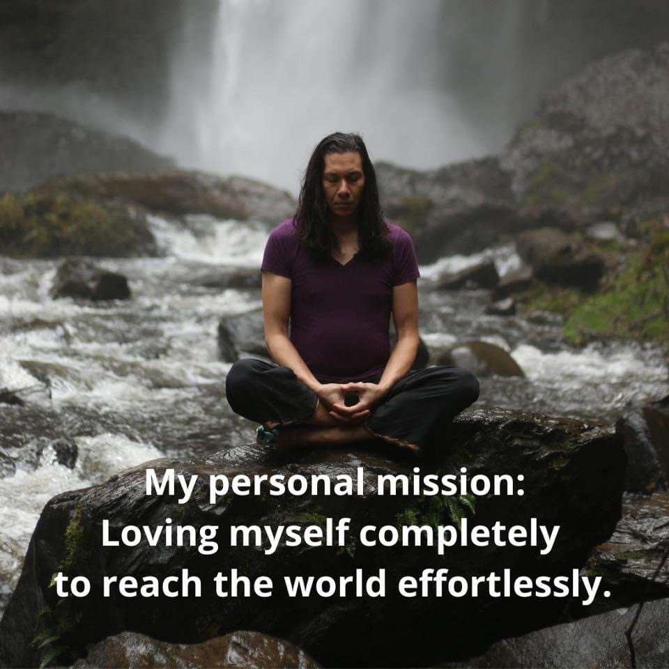 Eric Arthur meditating by a waterfall
